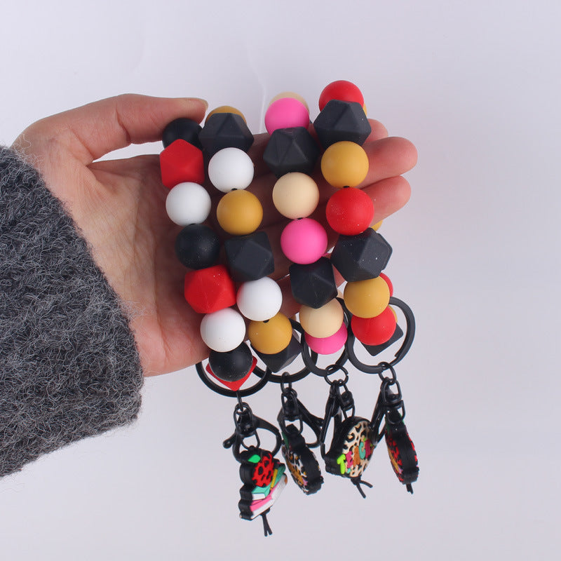 Wholesale Cartoon Apple Teacher Pencil Silicone Beaded Wrist Keychain